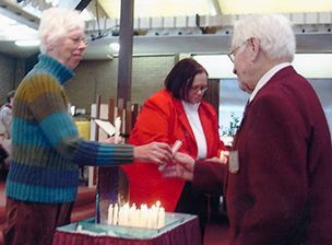 Rev. Mary Moore with Candles